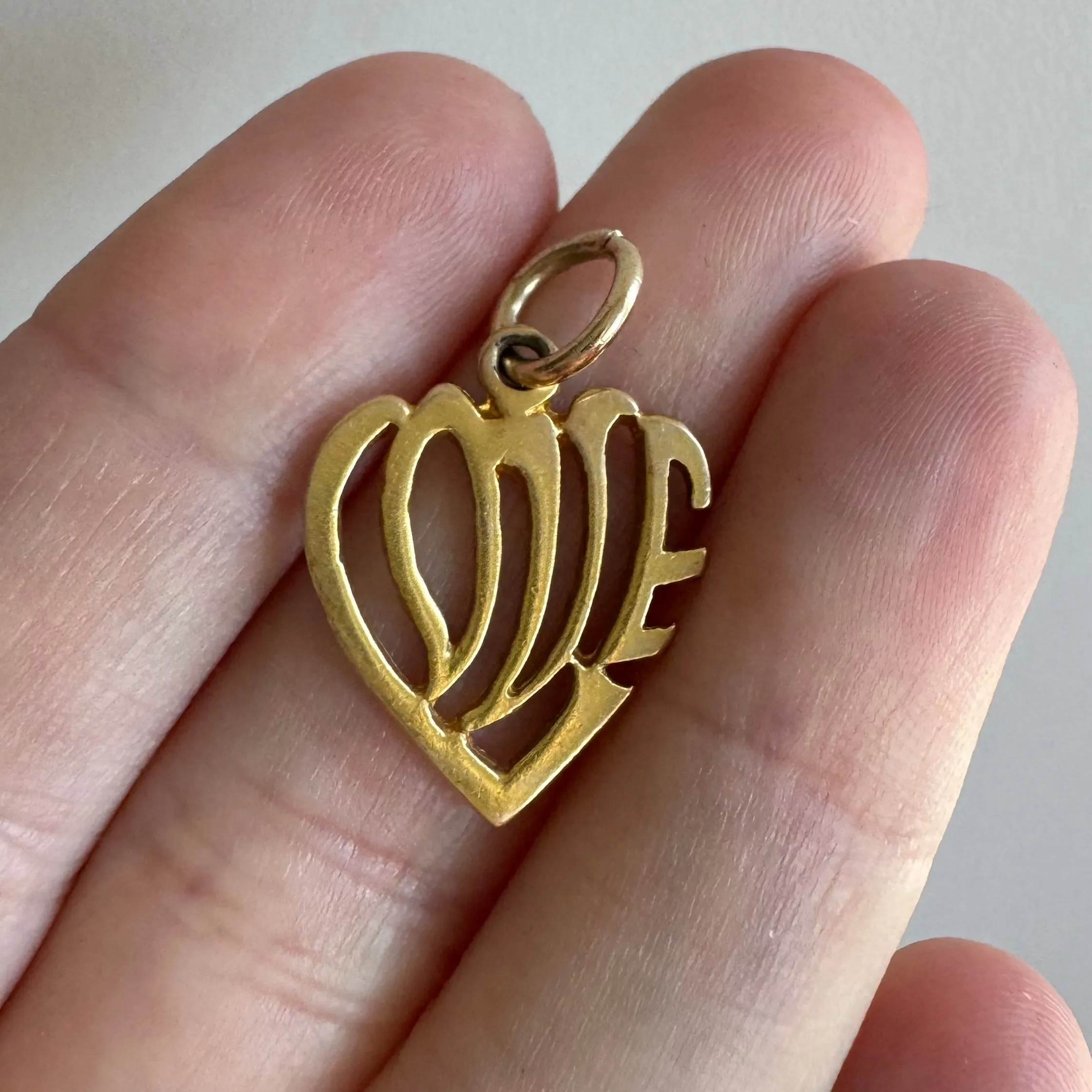 V I N T A G E // stylized LOVE / 10k yellow gold heart shaped love / a pendant